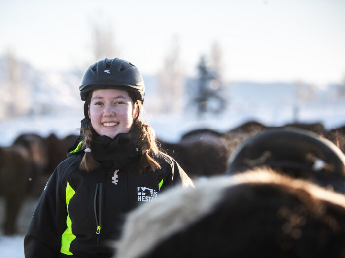 Happy girl riding the Icelandic Horse